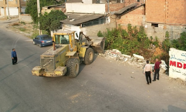 عملیات تخریب و بازگشایی در خیابان کارگر کوی کشاورزی جنب پل شهید عباس پور